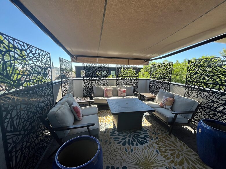 Top floor outdoor space with fire pit