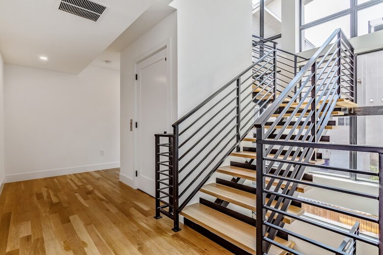 Second floor stairs and elevator