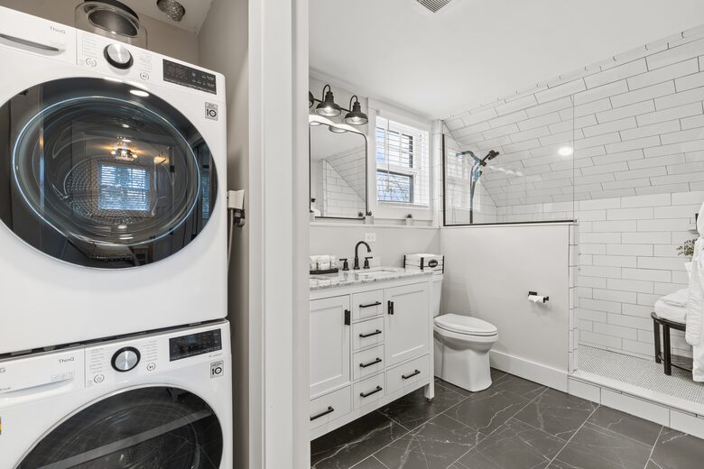 Master Bath with walk in shower, radiant heat floors and washer dryer