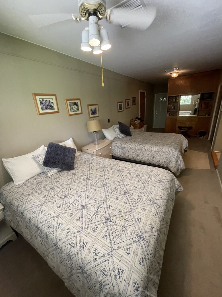 Back bedroom with two queen sized beds