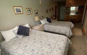 Back bedroom with two queen sized beds