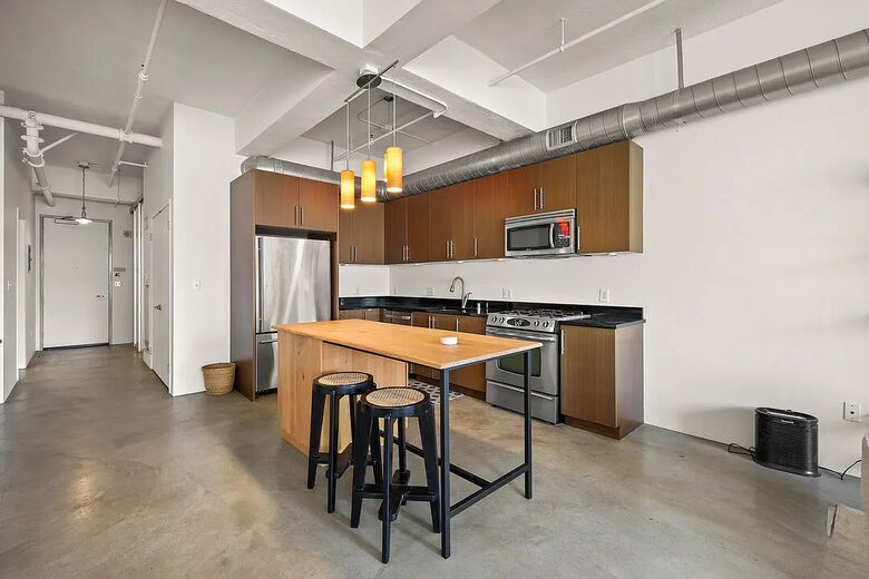 Iconic Eastern Columbia Loft with Balcony and City Views - Los Angeles, California