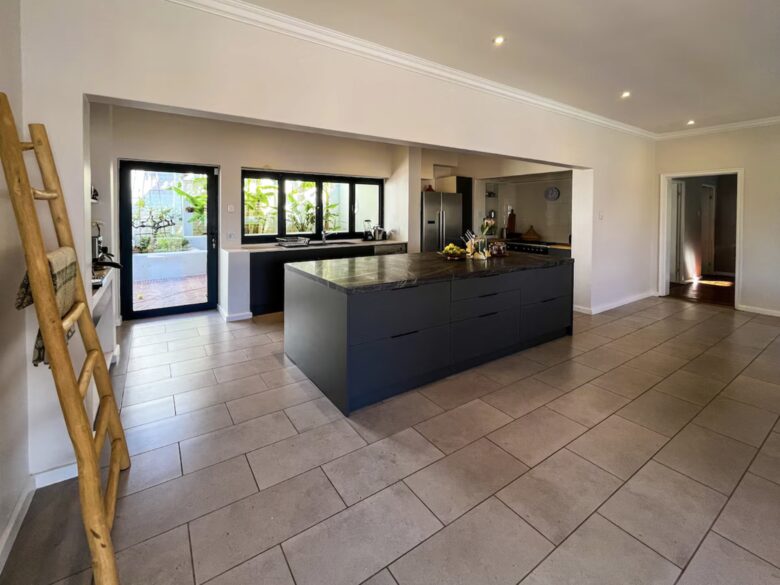 Kitchen with a view of the outdoor dining lounge