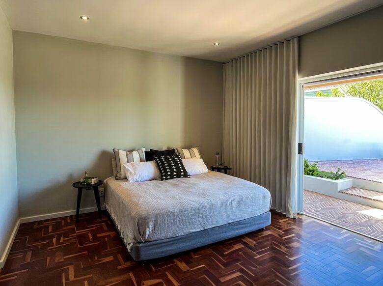 Principal BR | Sliding Doors open to the garden and a patio