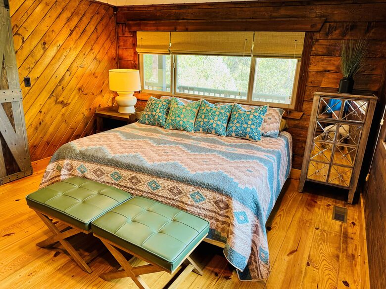 Bedroom #2 on main level with forest views