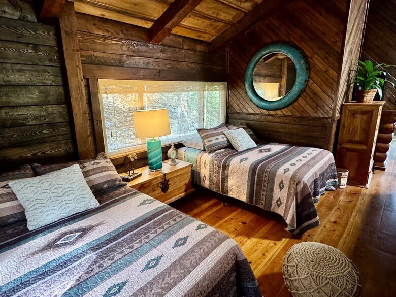 Loft bedroom with 2 full beds