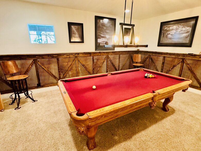 Billiard table with custom tin paneling