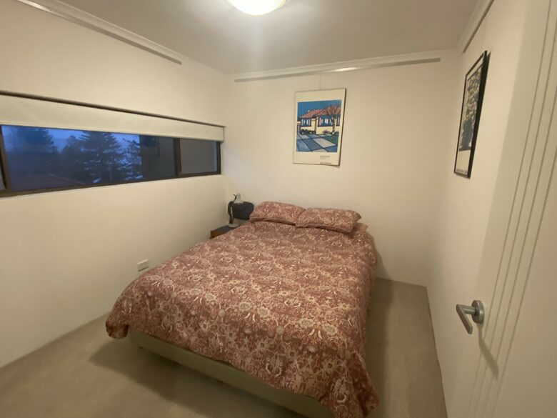 Second bedroom has double bed with inbuilt wardrobes and ocean views