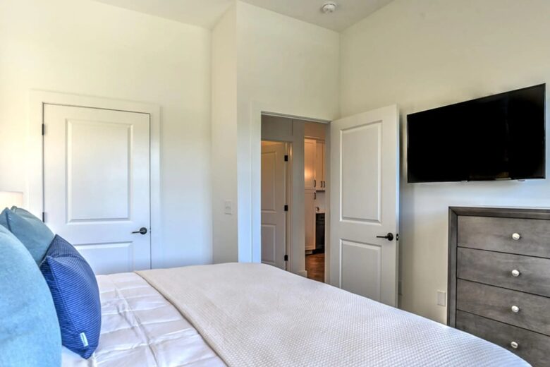 2nd Bedroom looking into Full Bath and Kitchen