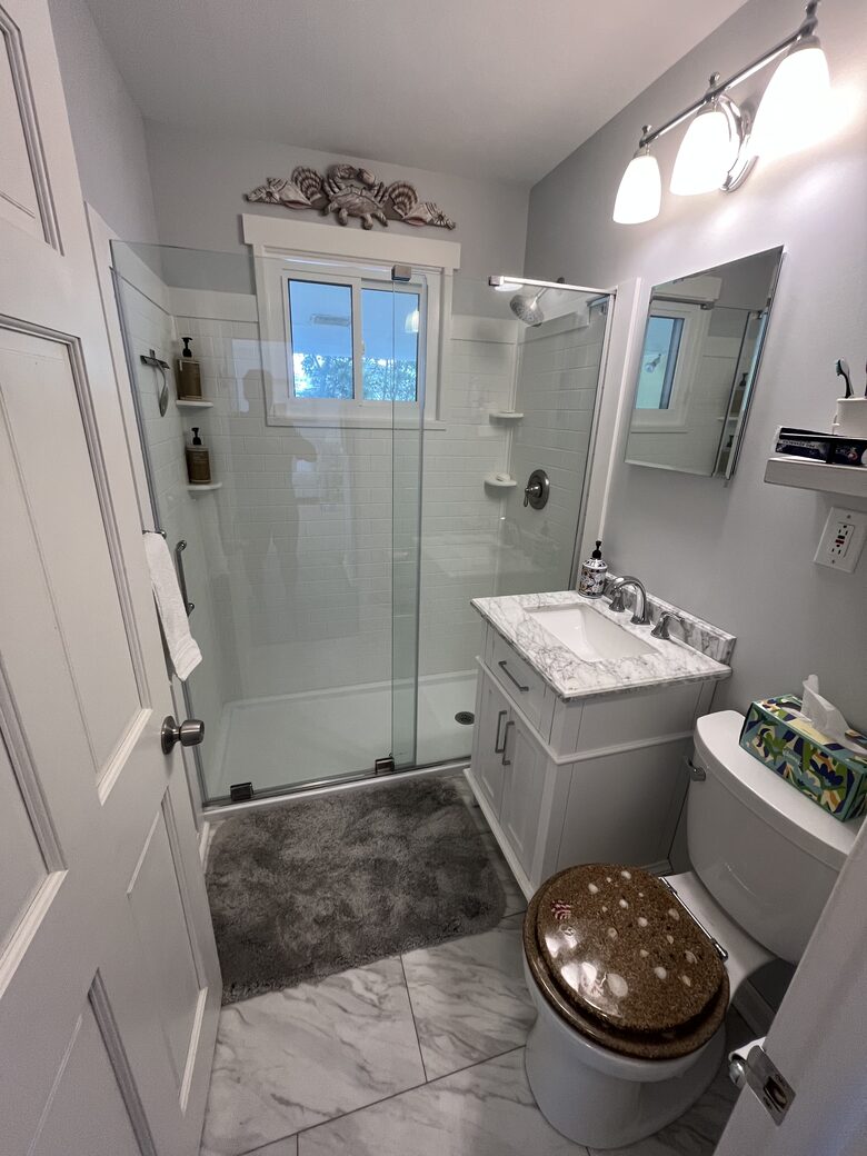 Bathroom with shower. Home has an enclosed outdoor shower as well.