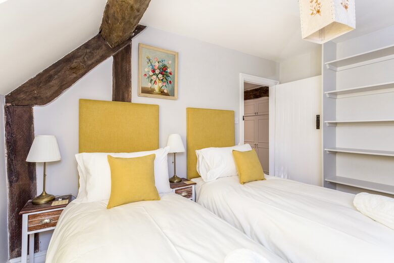 Yellow bedroom as a twin