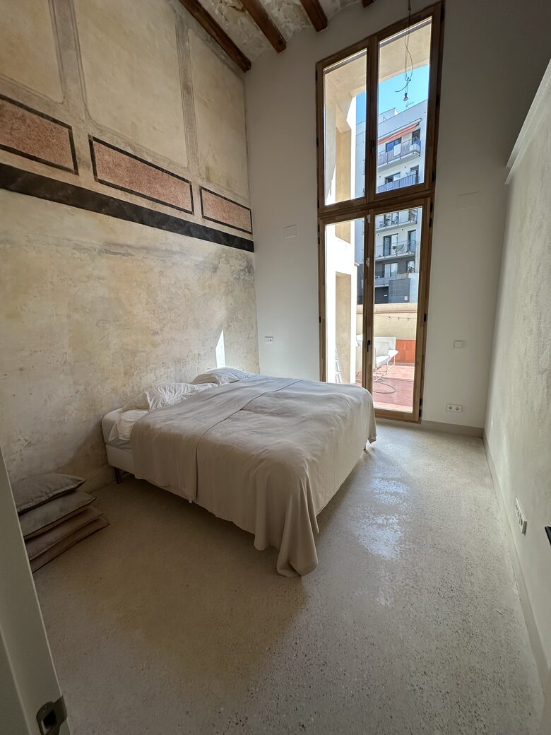 Primary bedroom with en-suite bathroom and access to terrace