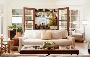 Living room open to both front and back patios