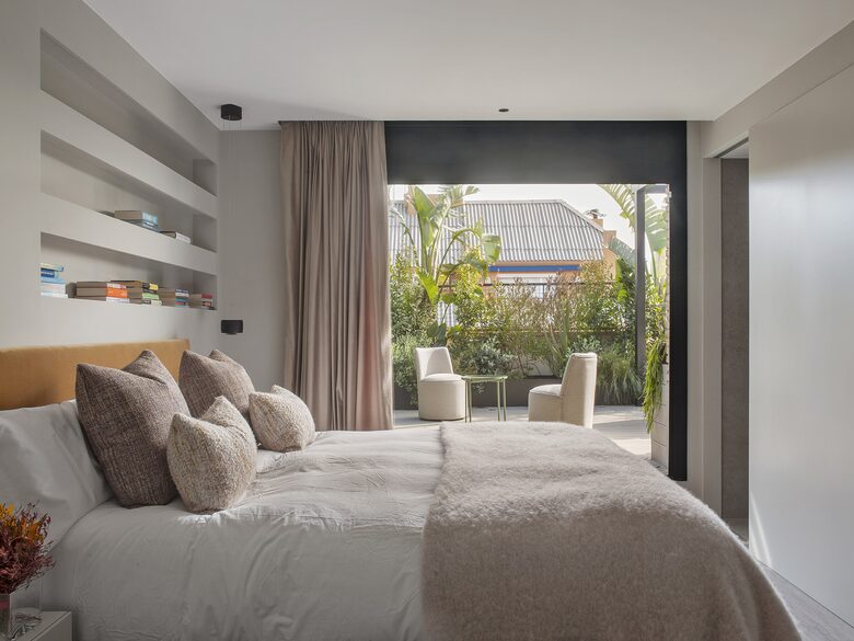 Primary Bedroom with accordion doors to outside