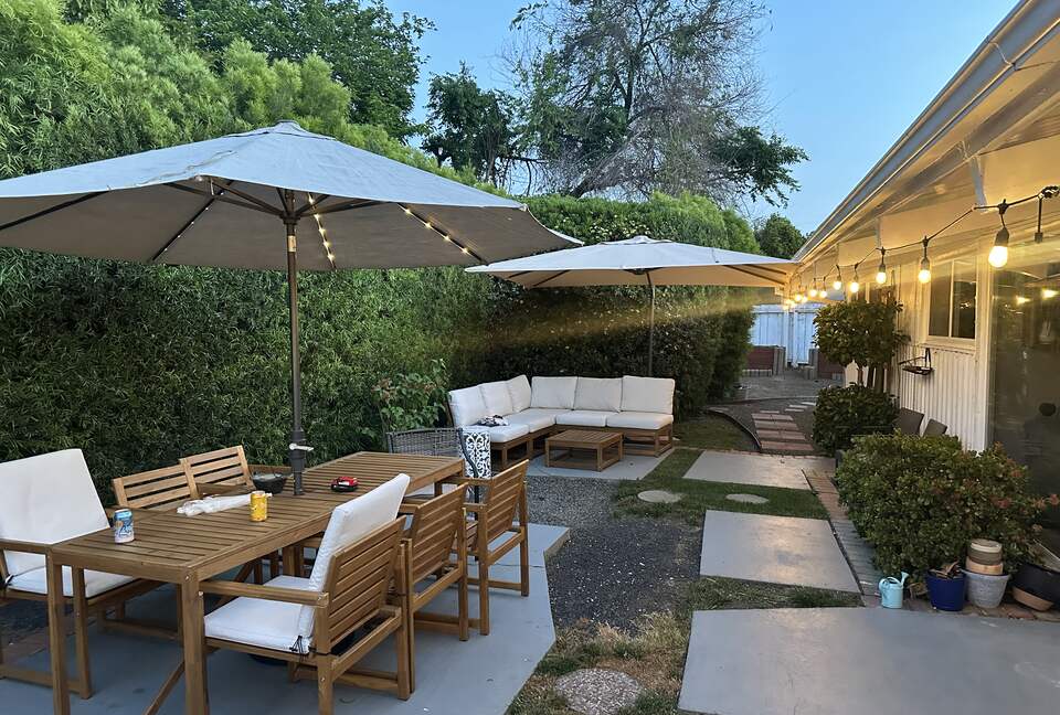 Backyard and Garden in back. Cafe lights.