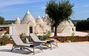 Elegant Trulli Living Amid Timeless Olive Groves - Cisternino, Italy
