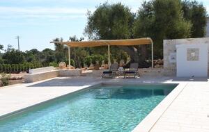 Elegant Trulli Living Amid Timeless Olive Groves - Cisternino, Italy