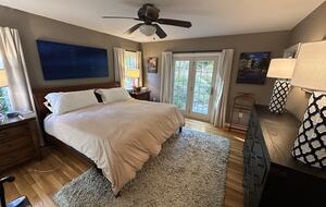 Primary Bedroom with French Doors to Garden & Outdoor Shower
