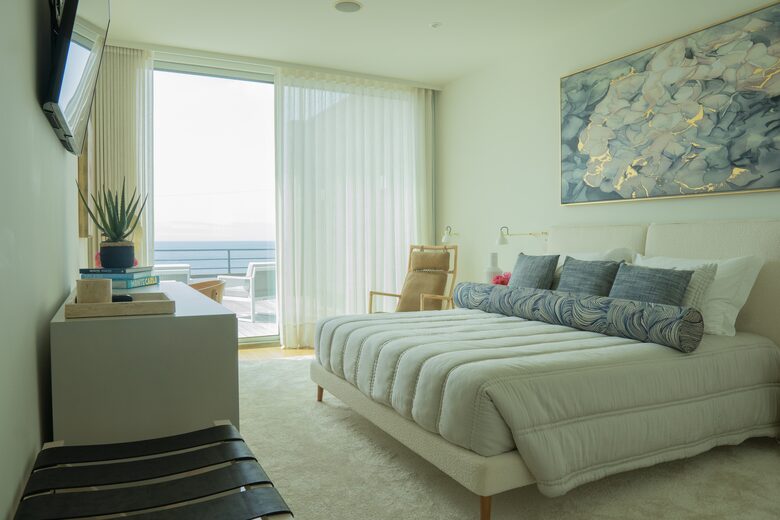 Primary Bedroom with Ocean Front Deck and En Suite Bath