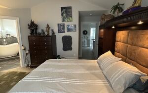 2nd Floor Master Bedroom with a Queen size bed