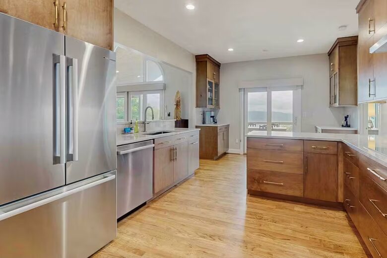 Kitchen boasts good views to outdoors or greatroom (TV)